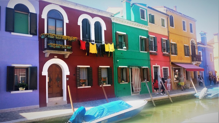 Colorful houses across Burano canals.