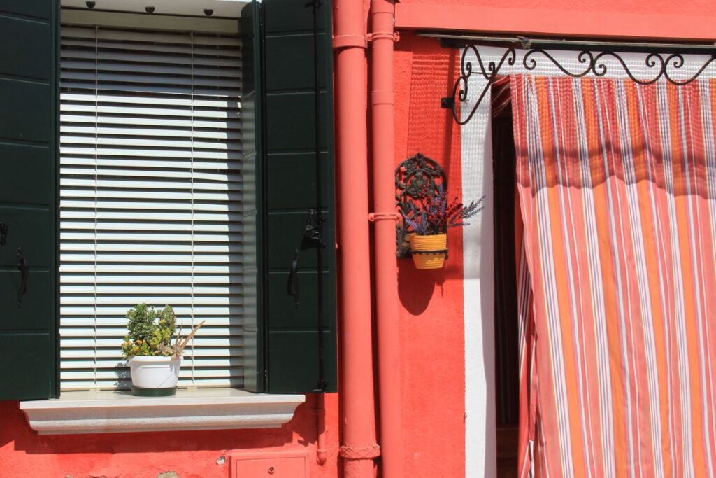 A brick red Wall in Burano Italy